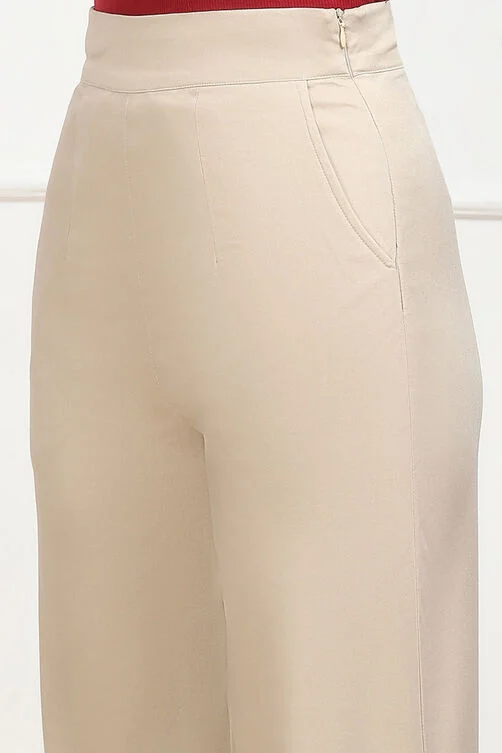 Women Beige Solid Stretchable Relaxed Fit Pants - Image 6