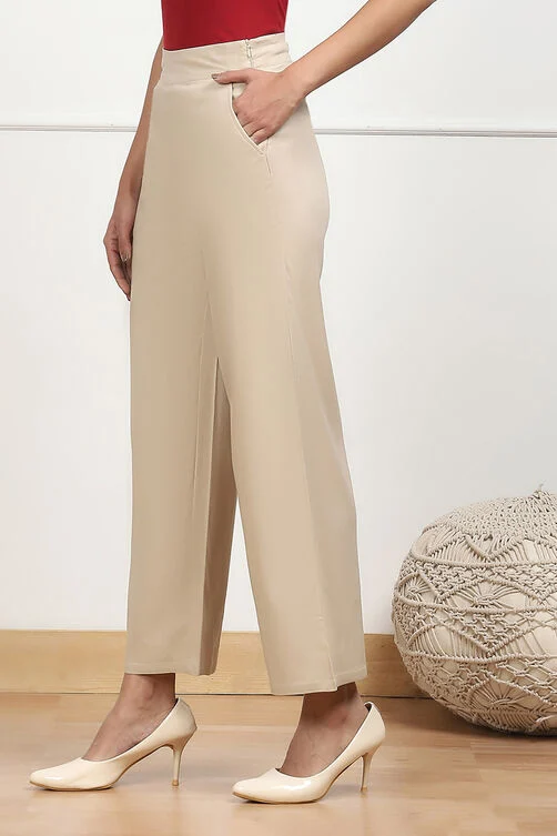 Women Beige Solid Stretchable Relaxed Fit Pants - Image 5